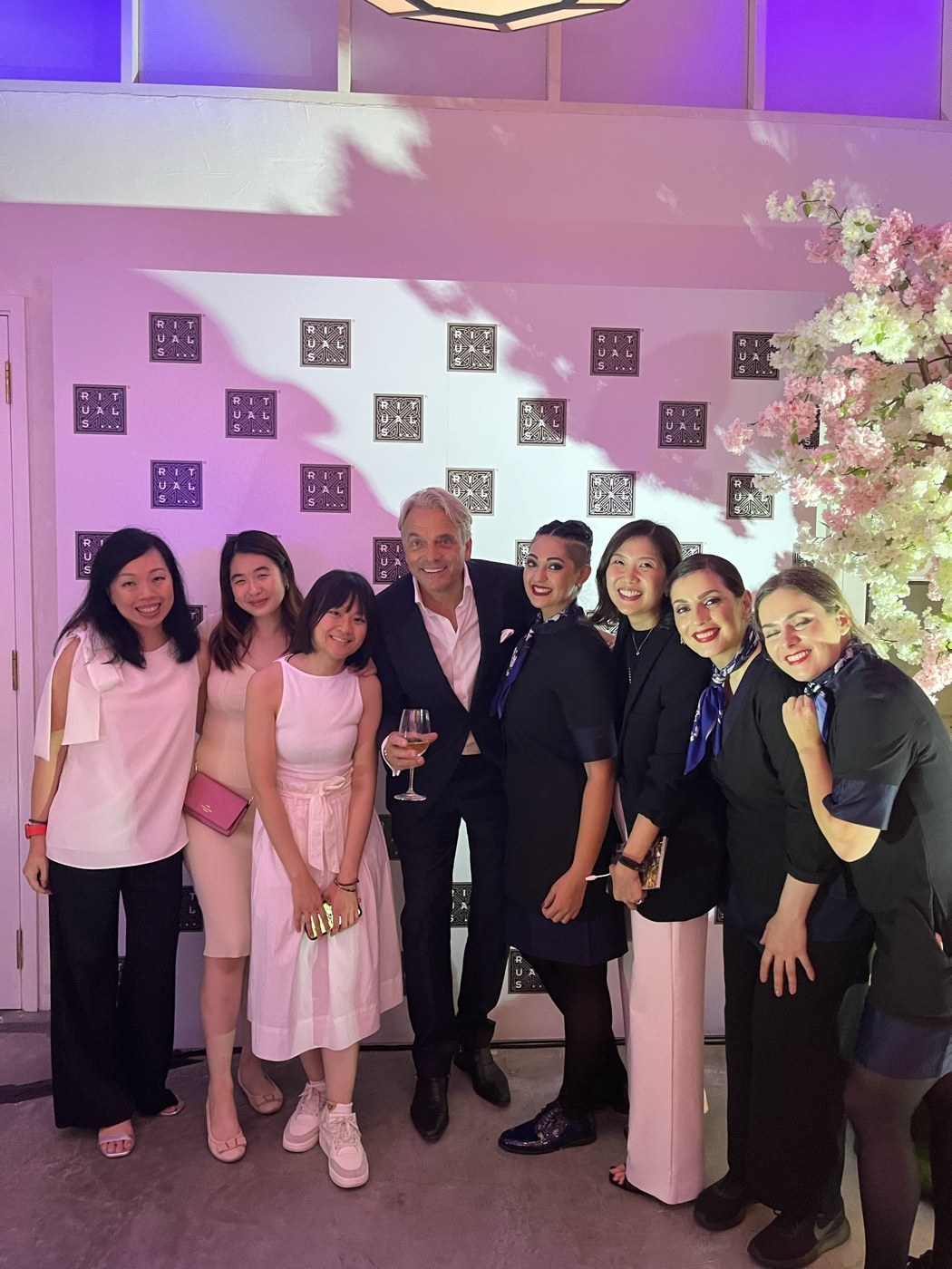 Guests and the team at the Rituals launch event backdrop